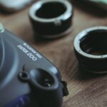 A camera sitting on top of a wooden table